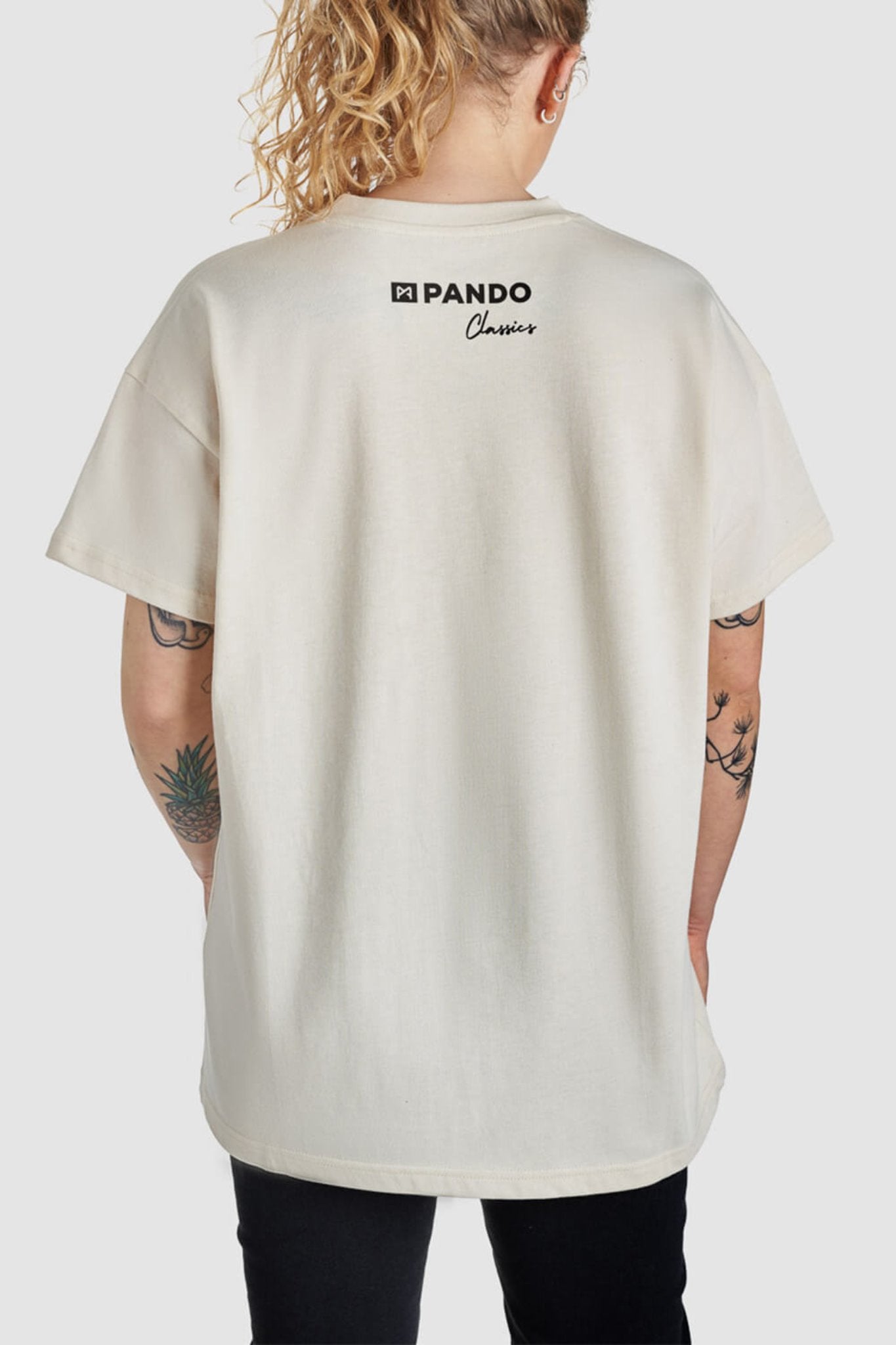 woman's back wearing Pando Classics t-shirt