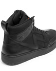 Black high-top sneaker on a white background