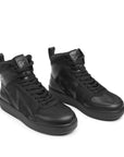 Pair of black high-top sneakers on a white background