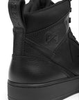 Black high-top sneaker with brand logo on a white background