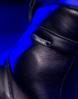 Black leather boot with 'Falco' branding on a blue background