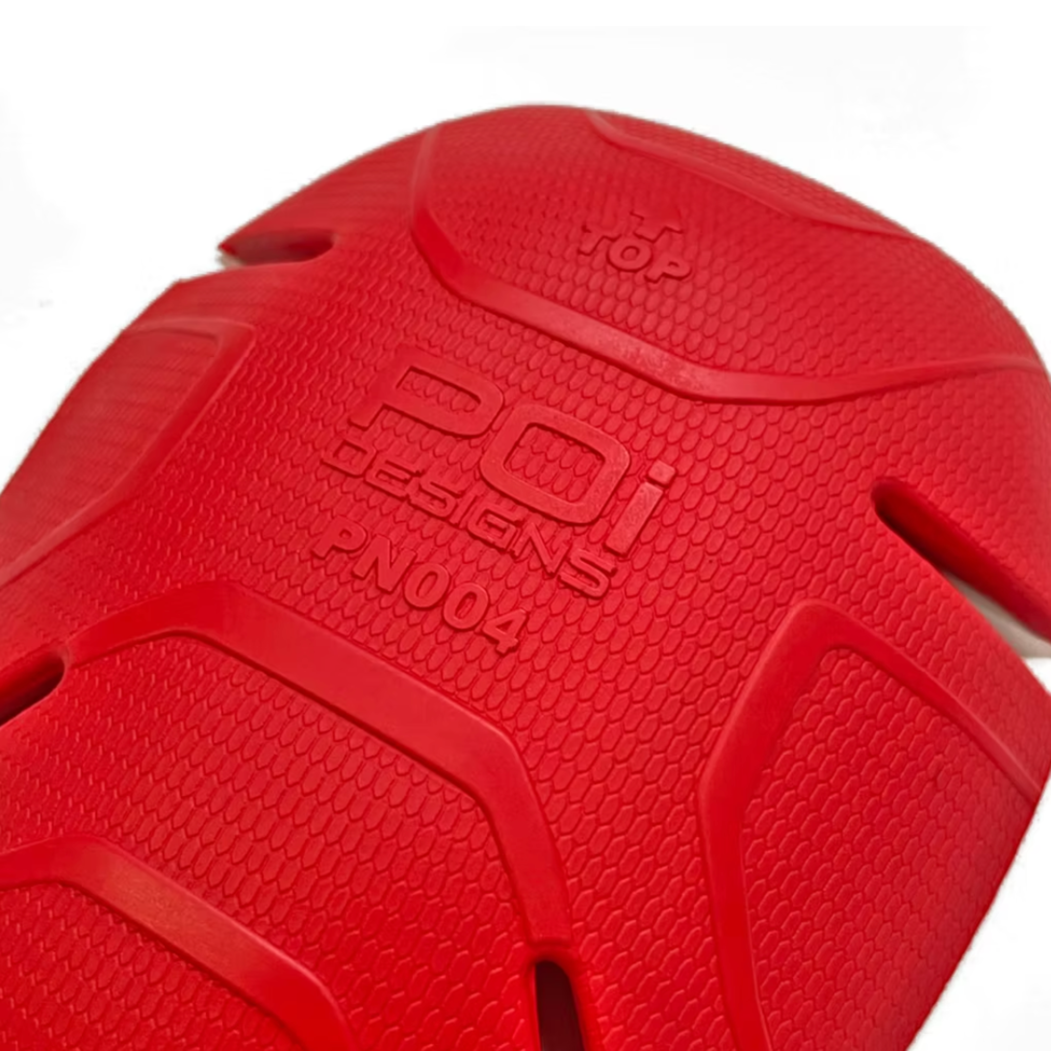 close up of POi Designs shoulder and elbow red protector