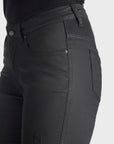 A side of woman's legs wearing slim-fit motorcycle jeans from Pando Moto