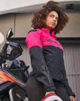 a young woman wearing pink DRIFT motorcycle jacket from Shima