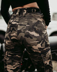 A woman's bottom wearing  camouflage motorcycle cargo pants from Moto Girl