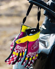 Ride like a Girl pink, black and yellow women's motorcycle gloves from eudoxie hanging on a motorcycle