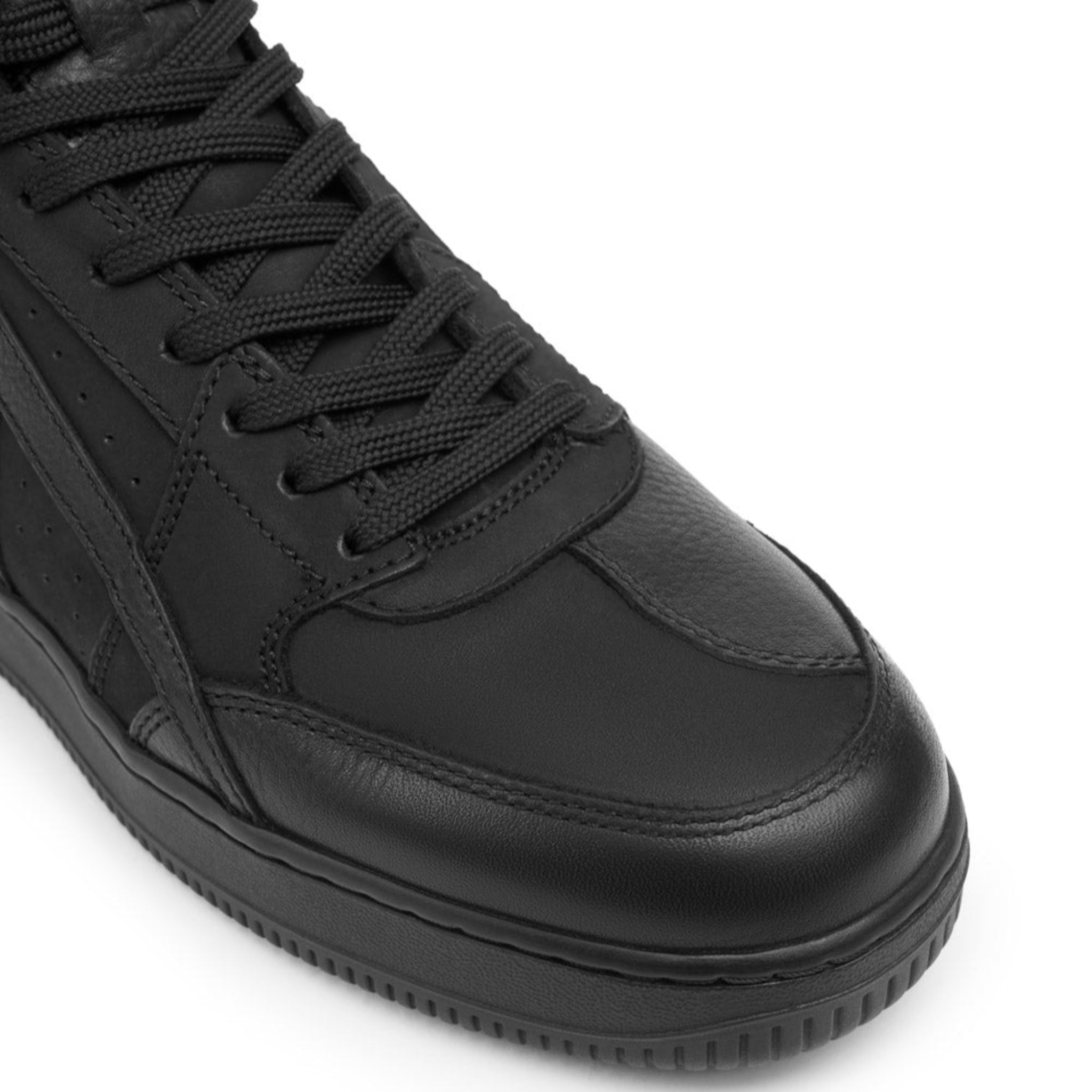 Black high-top sneaker on a white background
