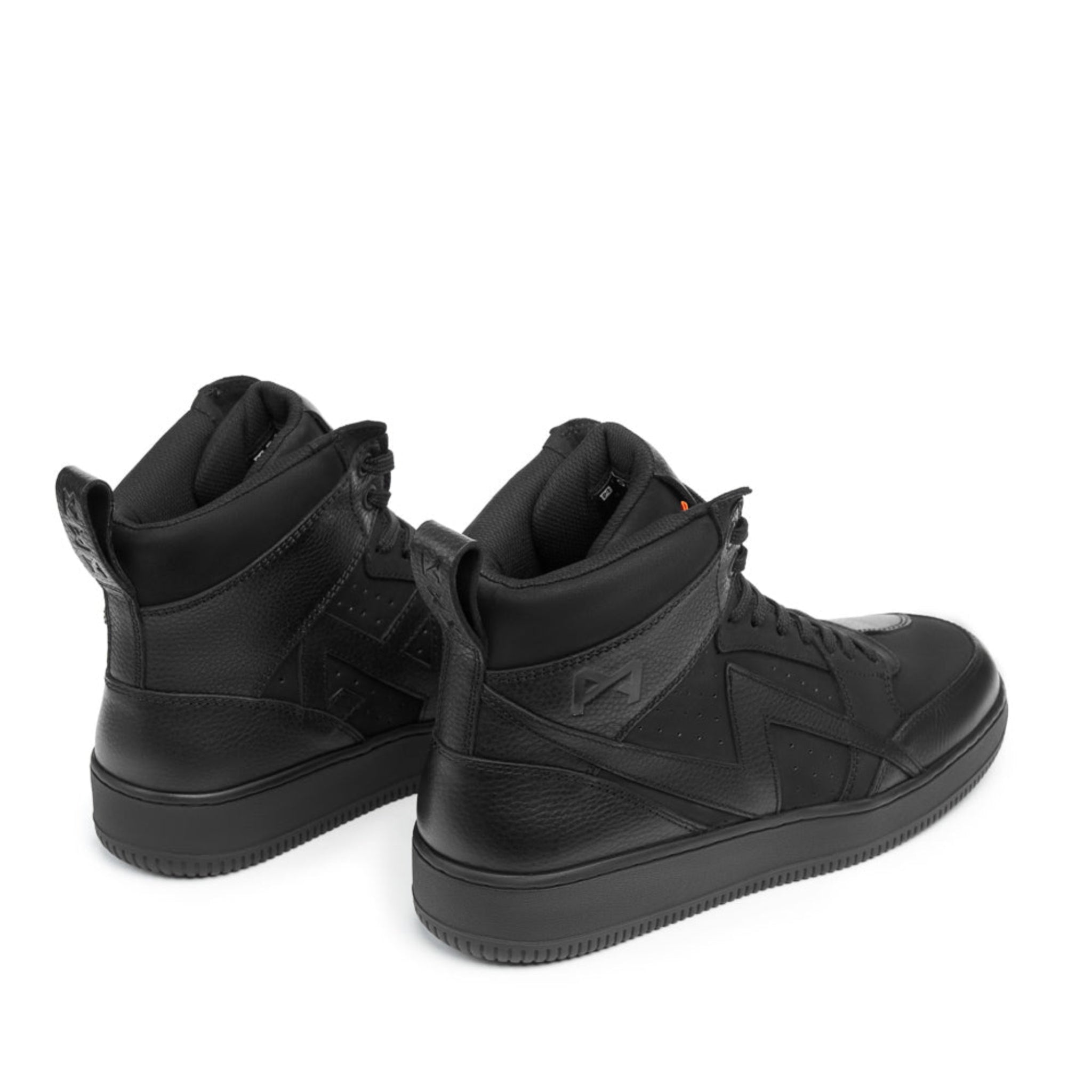 Black high-top sneakers on a white background
