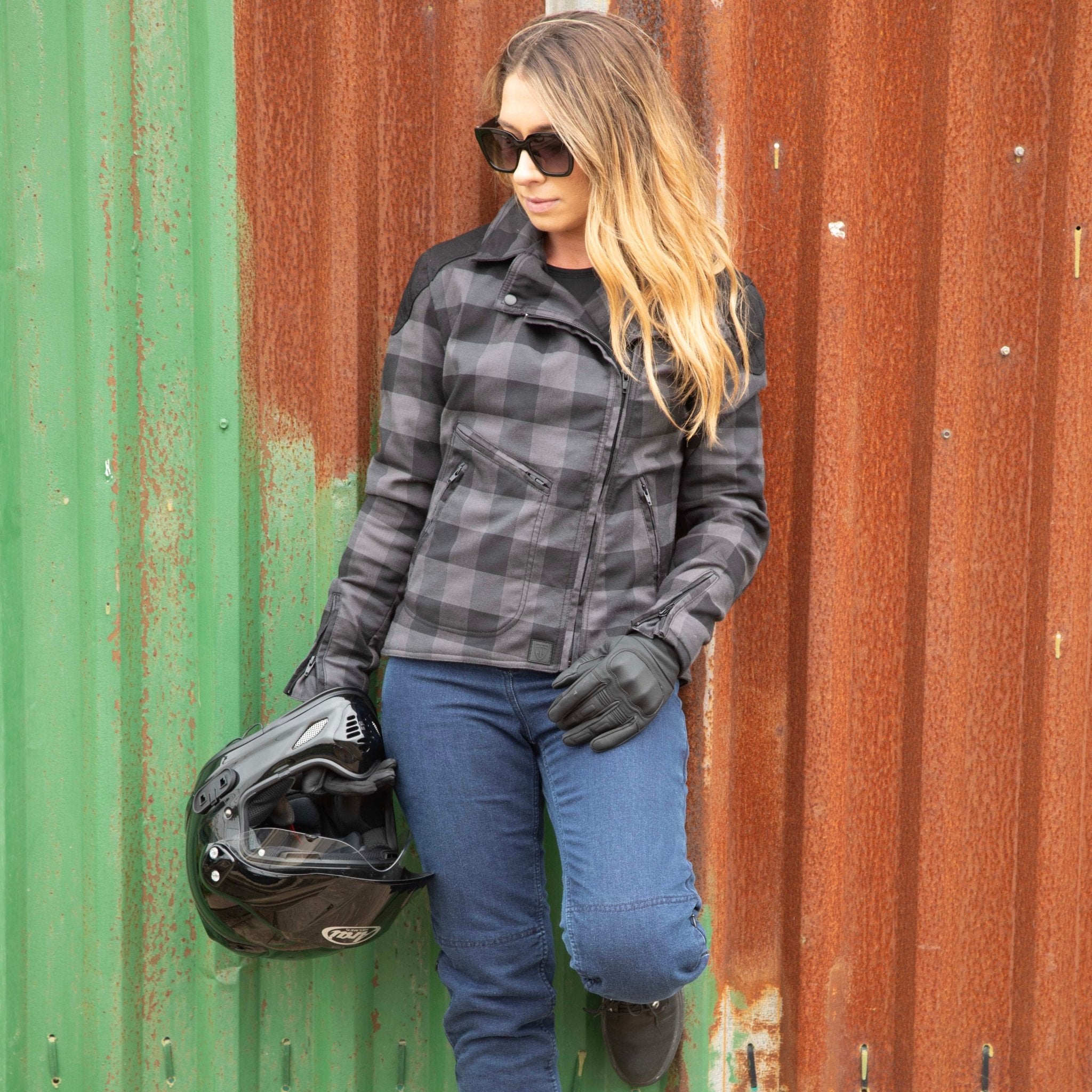 a woman wearing Blue motorcycle jeggings for women from MotoGirl