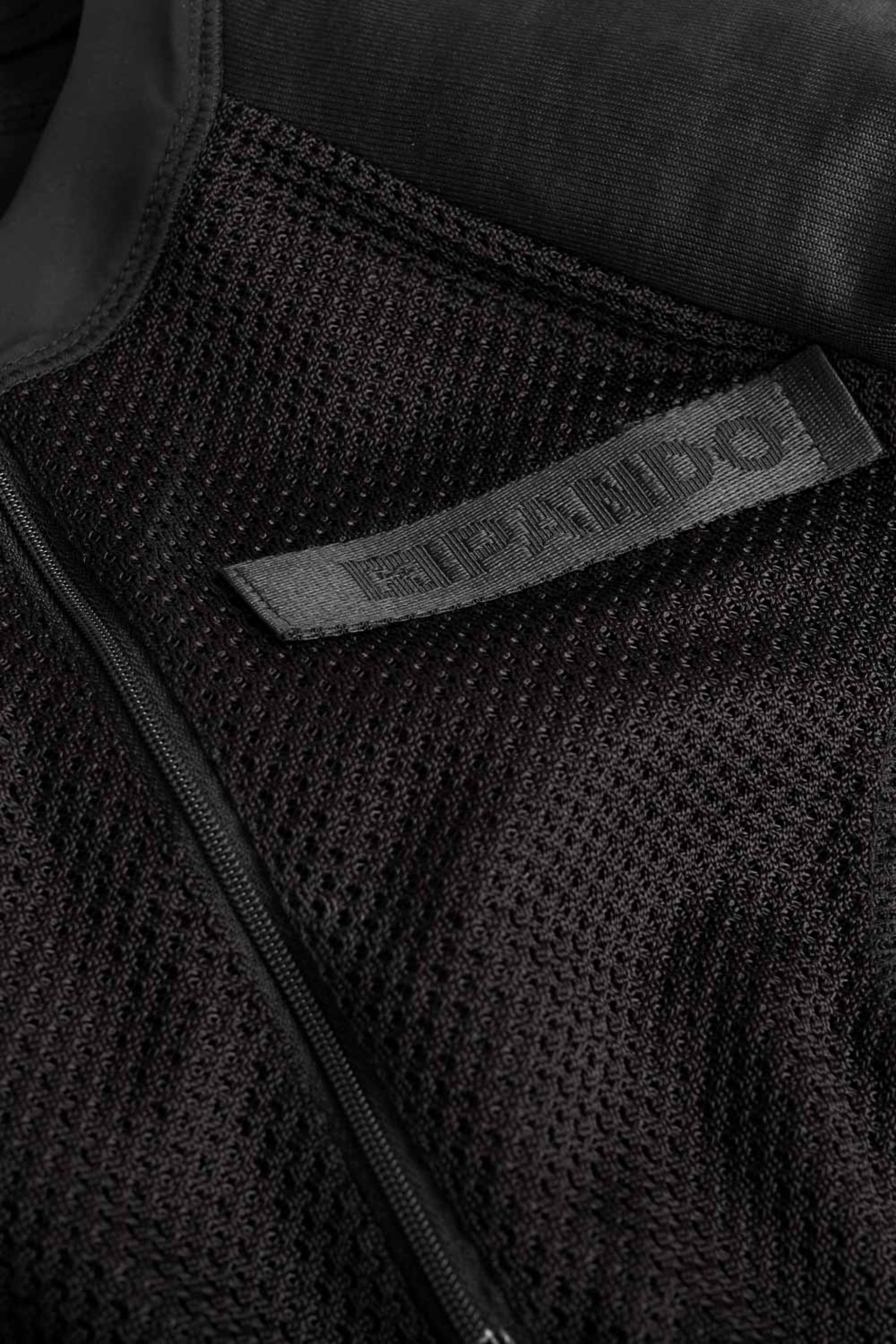 a pando moto logo on a mesh black body suit base layer for women from Pando 