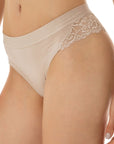 women wearing nude-colored  brazilian brief with lace flounce details on the sides from Tramonte.