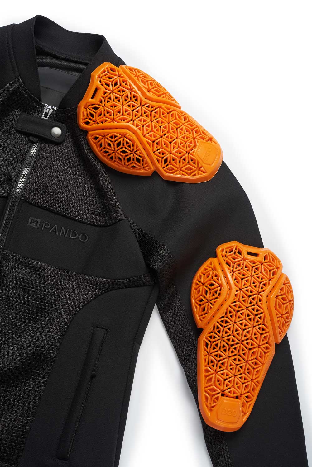 Black jacket with orange protective shoulder pads on a white background