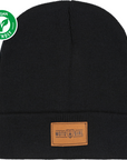 Black beanie from MotoGirl with a brown faux leather tag on the front featuring the MotoGirl logo, and a 'Vegan Friendly' logo in the corner.