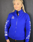 a blond woman wearing Motogirl clothing blue sweatshirt with a front zip