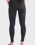 Woman's legs and bottom wearing Pando Moto SKIN AAA armoured base layer leggings in black