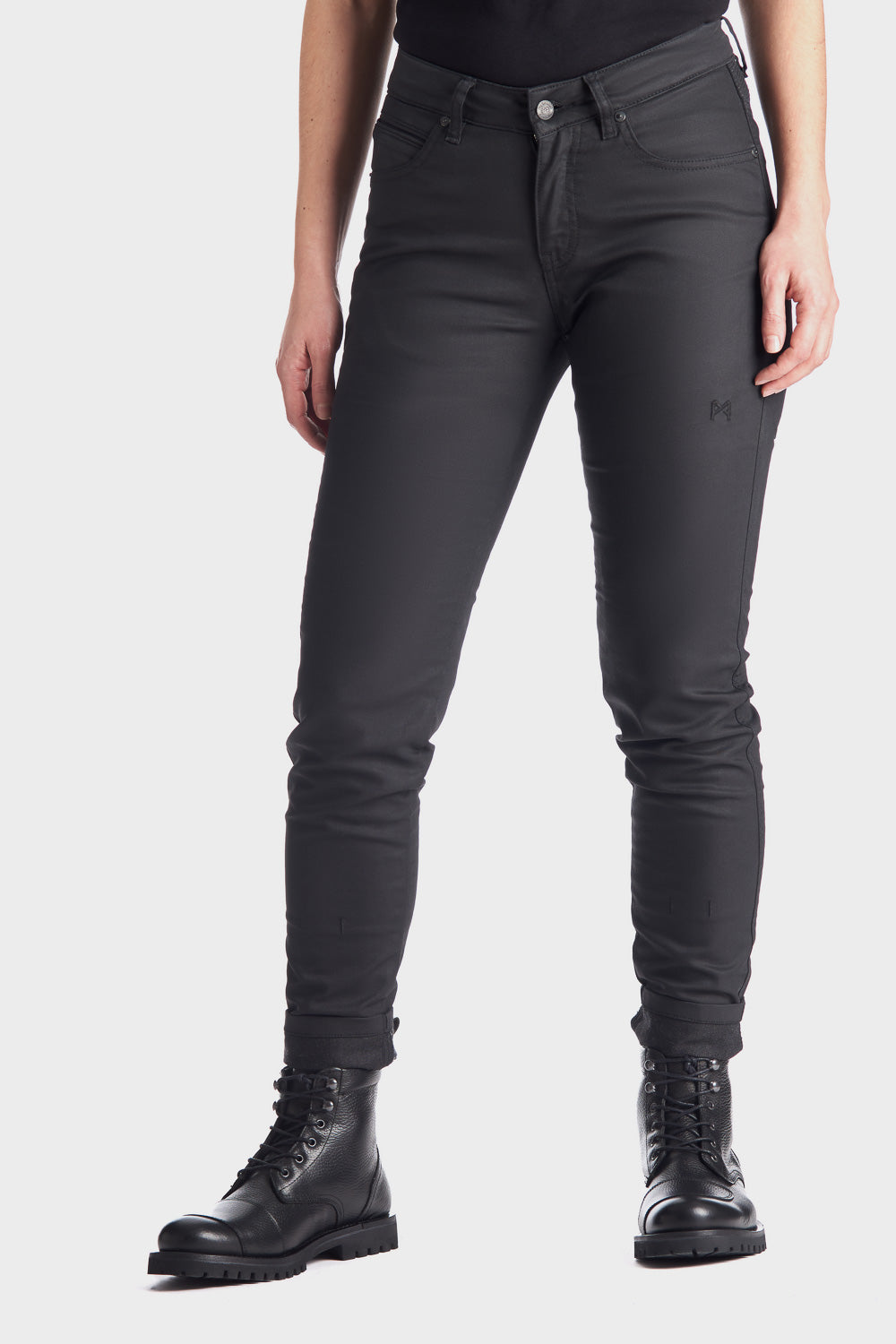 woman&#39;s legs wearing slim-fit motorcycle jeans from Pando Moto 