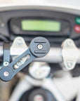 A moto mount pro mounted on a motorcycle handlebar