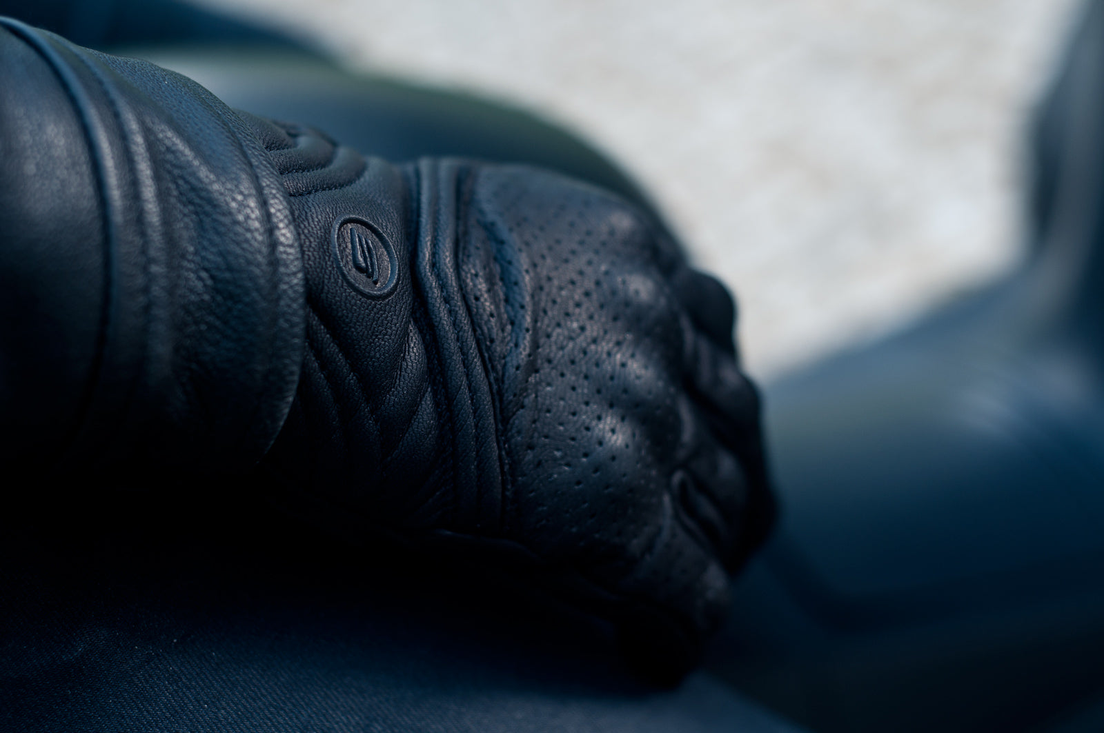 Black leather female motorcycle glove from Shima close up