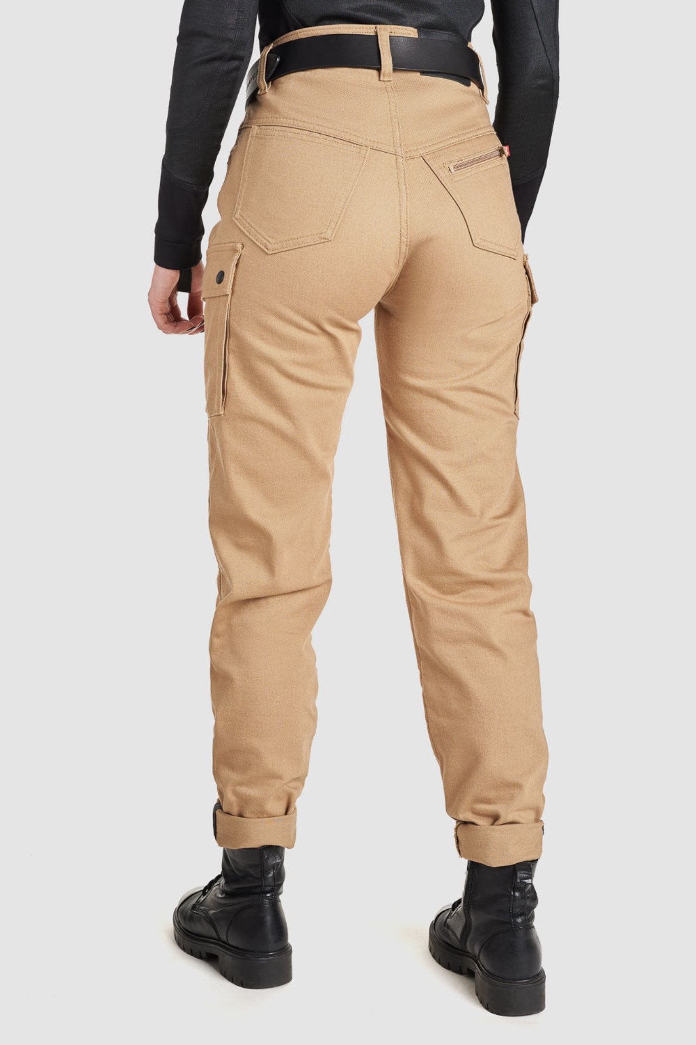 back of woman's lower body wearing beige mila mc cargo pants for ladies from pando moto