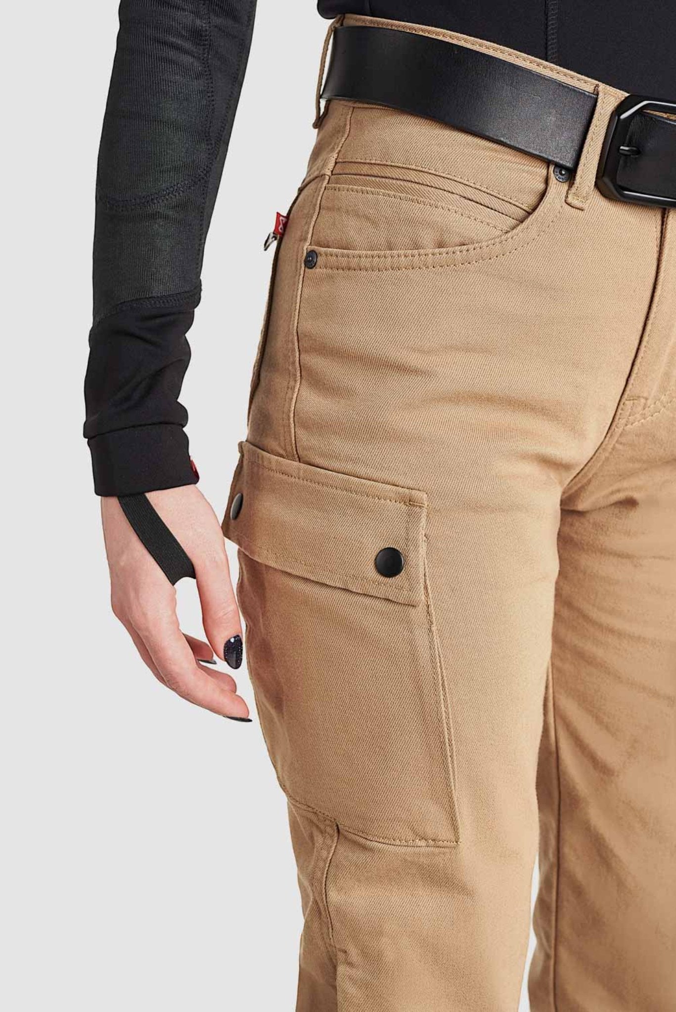 A close-up of the cargo pocket on the beige women&#39;s MC pants from the side.