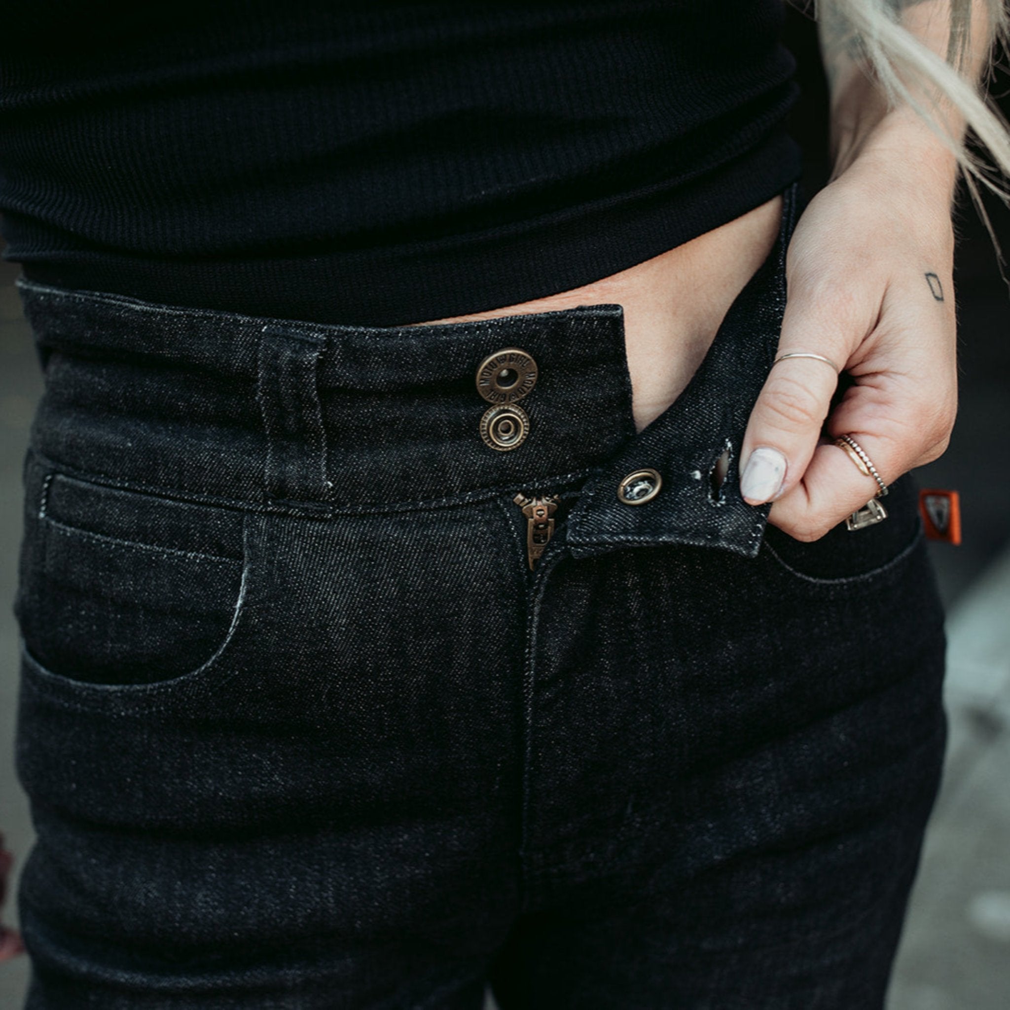 Closure of black lady motorcycle jeans from Moto Girl