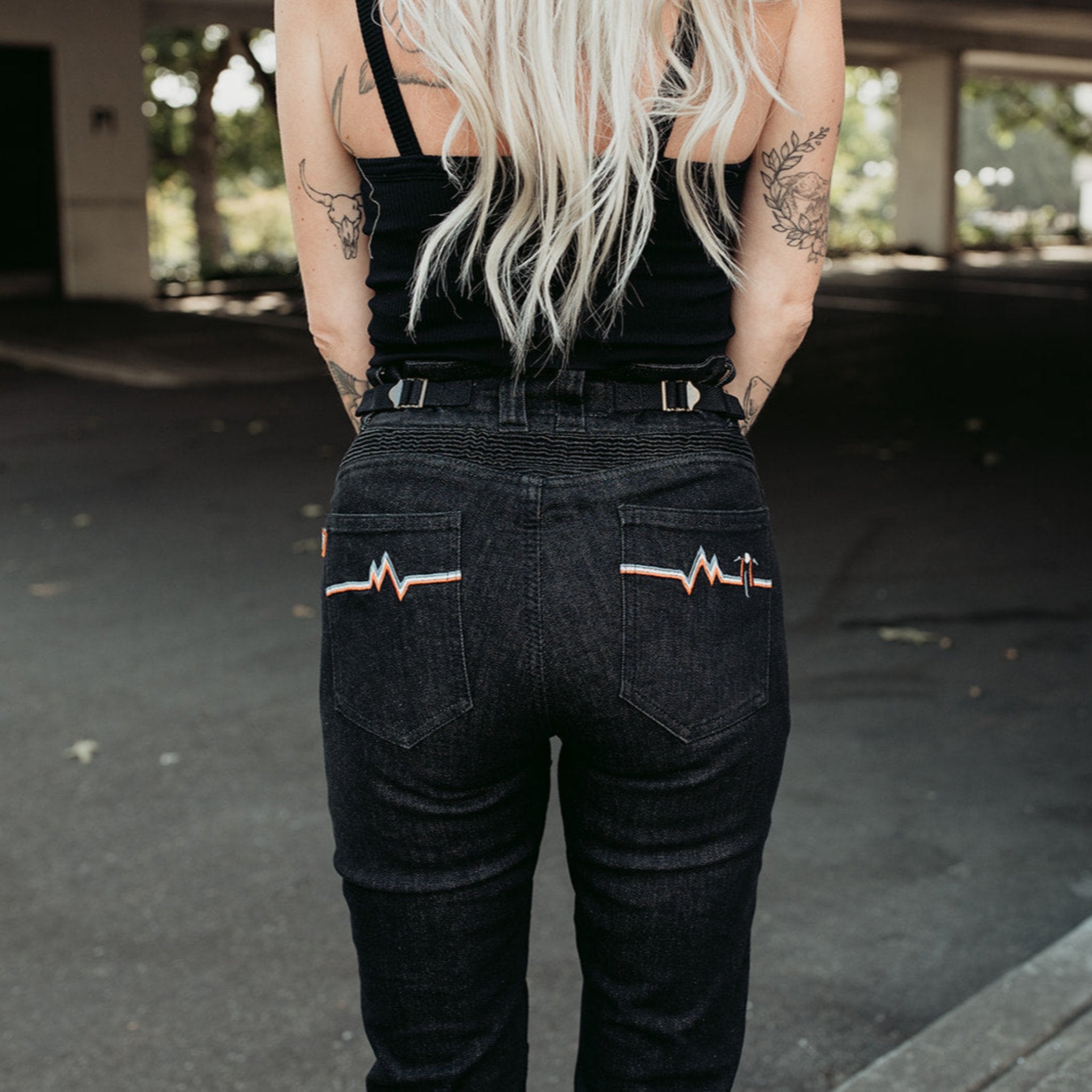 A bottom of a woman wearing high waist lady motorcycle jeans from Moto Girl