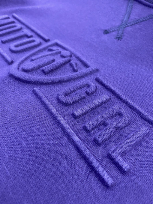 A close up of the 3d logo on a women's motorcycle sweatshirt from Moto Girl 