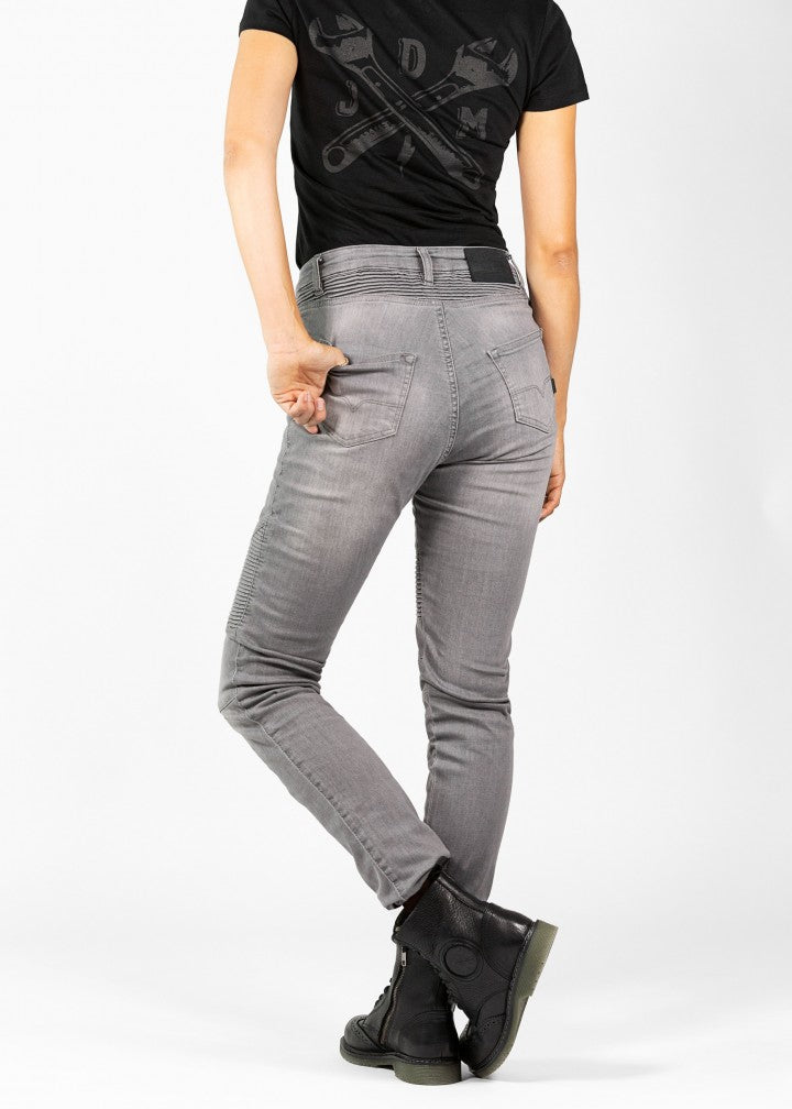 Woman's legs from the back wearing light grey women's motorcycle jeans from JohnDoe